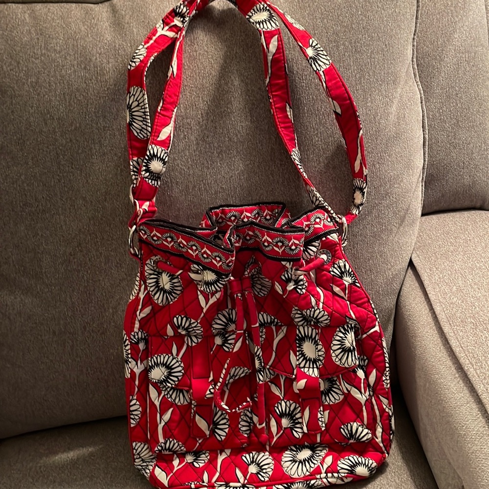 Vera Bradley red background with white and black flowers bag